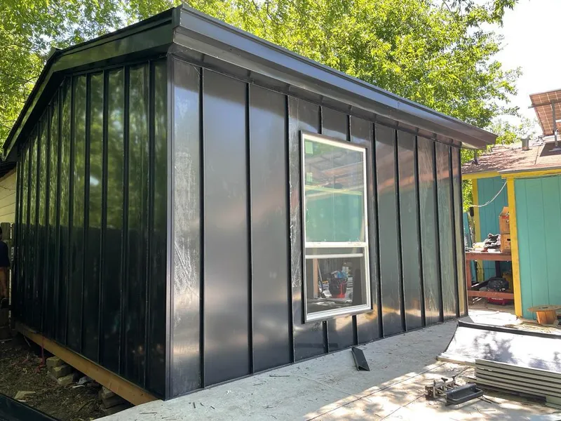 Black standing seam metal wall panels for Metal Roof Installation in Roxbury