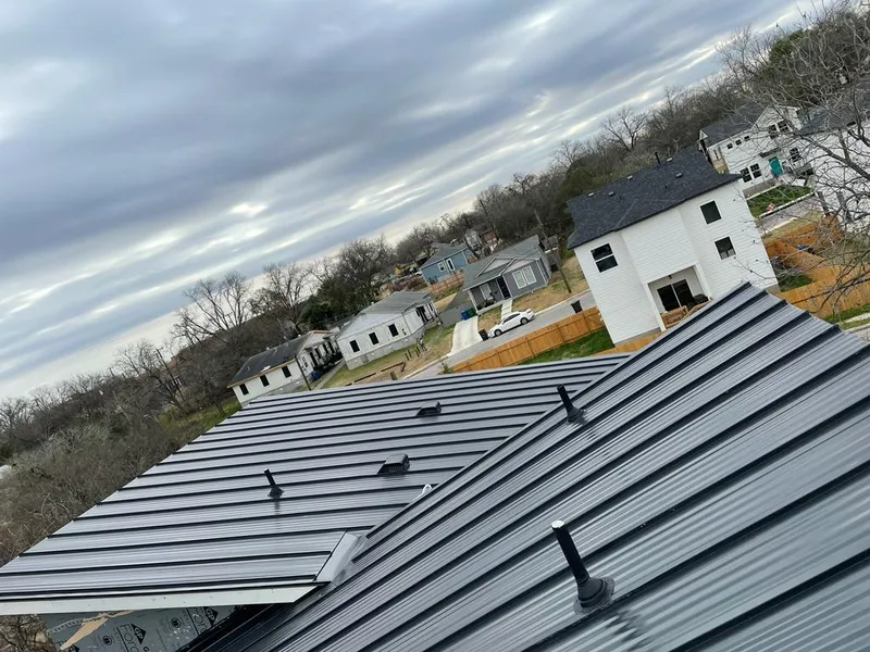 Standing seam metal roof panels with vents for Skylight Repair in Roxbury